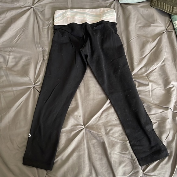 Lululemon black leggings with pink waistband, fits size 2-4 - Picture 3 of 3